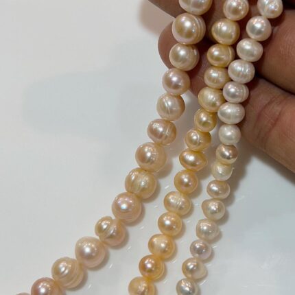 مروارید پروررشی گلبهی ( فروش نیم ریسه)