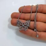 اسانسوری گردنبند نقره ای استیل
