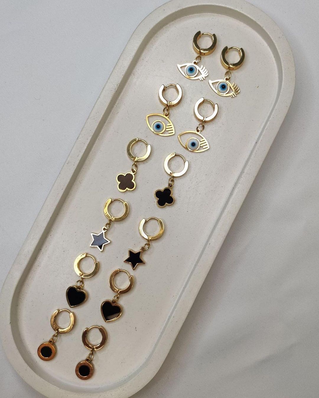 366744344_18382108453022254_3060066080730006765_n گوشواره پلاک دار